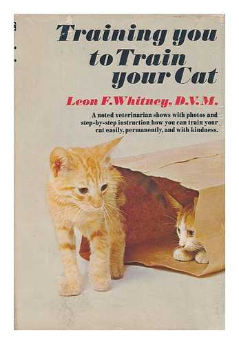 WHITNEY, LEON FRADLEY (1894-) - Training You to Train Your Cat [By] Leon F. Whitney. Photos. by Stephen Hodio