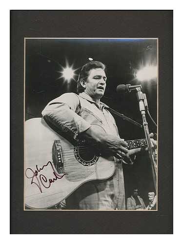 CASH, JOHNNY - Johnny Cash : SIGNED mounted b/w promotional photograph