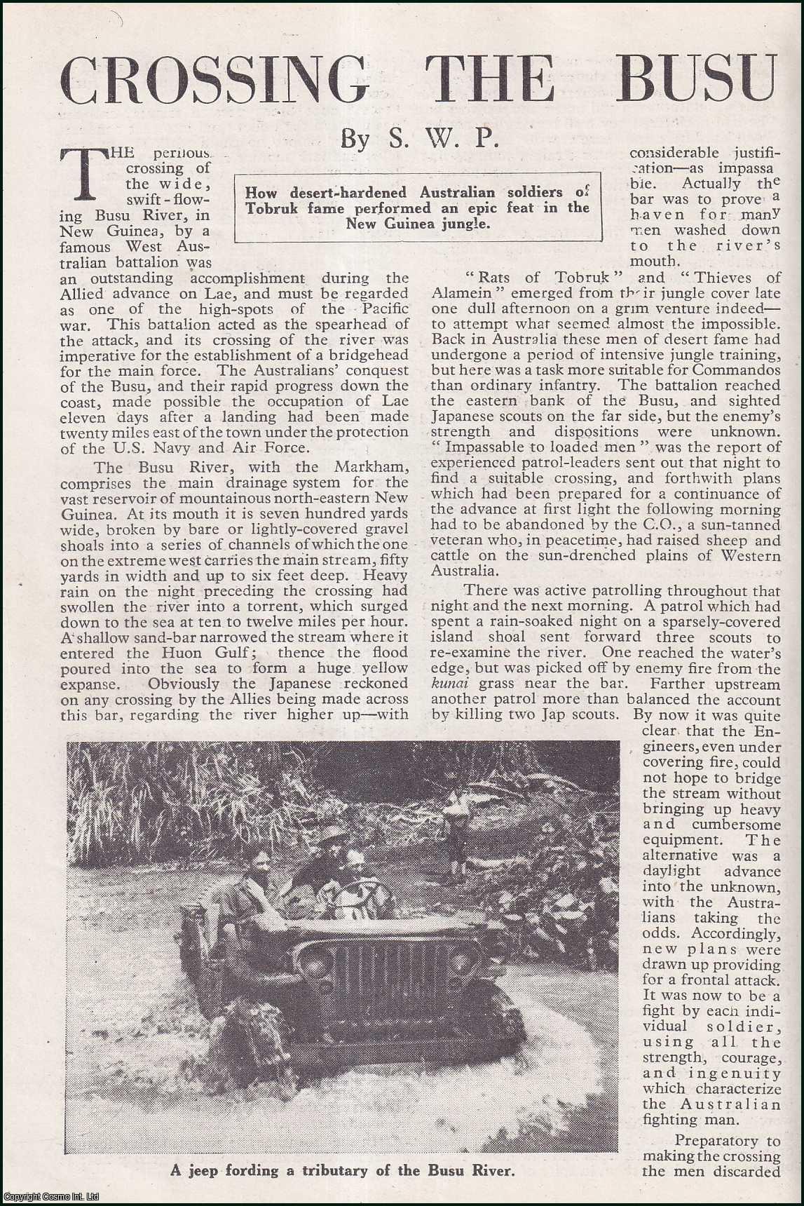 S.W.P. - Crossing the Busu : Australian Soldiers of Tobruk in the New Guinea Jungle. An uncommon original article from the Wide World Magazine, 1945.